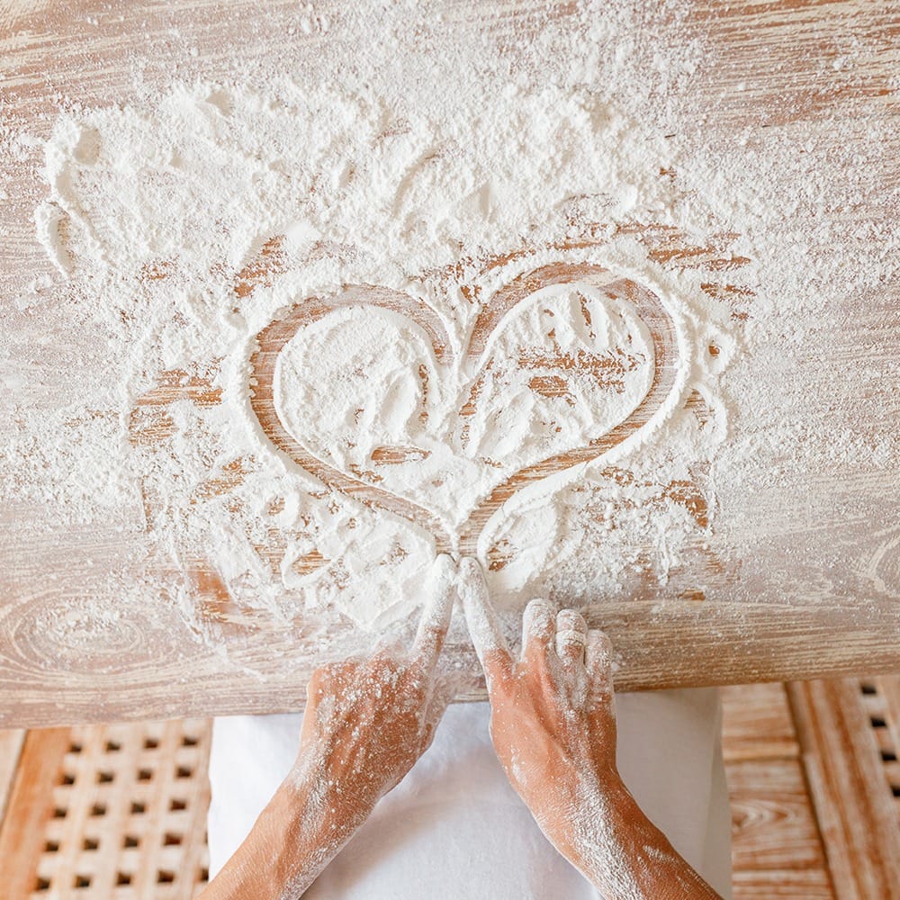 A heart drawn out of flour